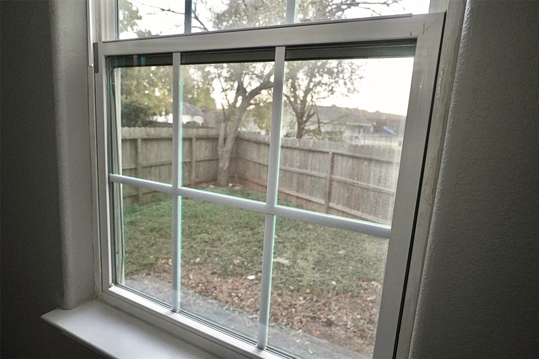 2523 Kirk Street, Unit B Houston, TX 77026 - Photo 15 of 16 a view of a glass door and a window