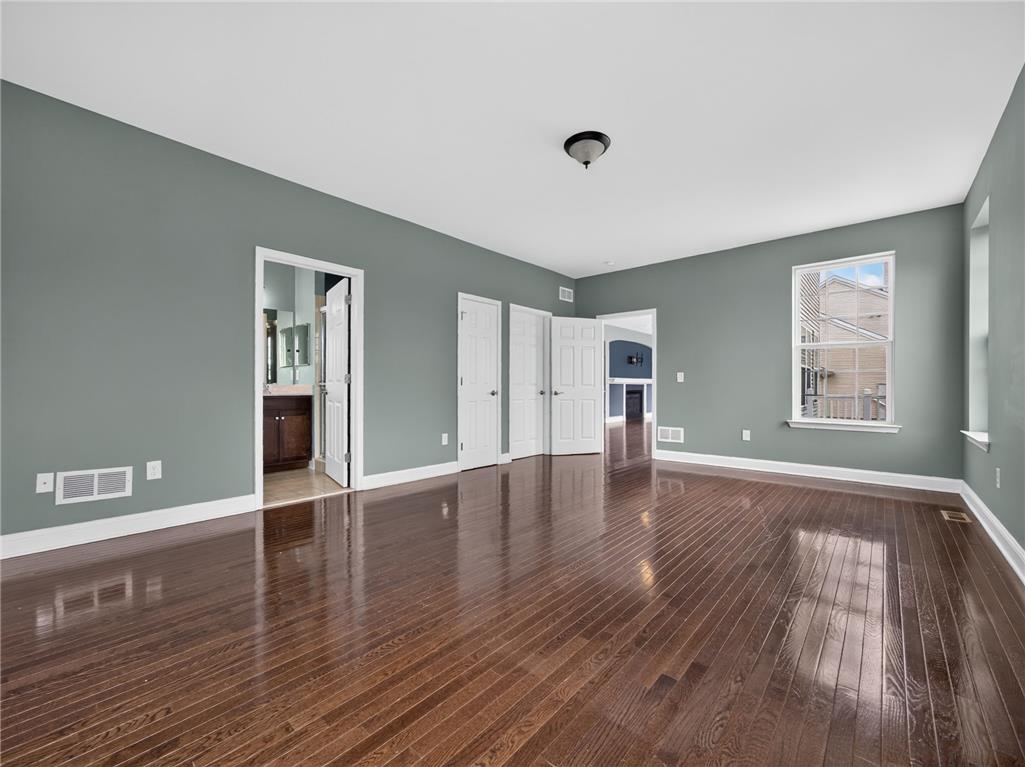 2765 Farmstead Road Easton, PA 18040 - Photo 32 of 50 Lustrous hardwood floors create an inviting atmosphere in this well-appointed bedroom.