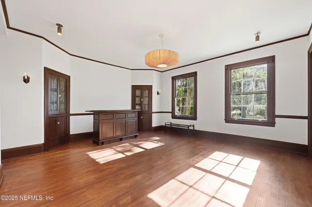 a kitchen with sink and refrigerator