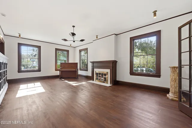 a view of entryway with wooden floor