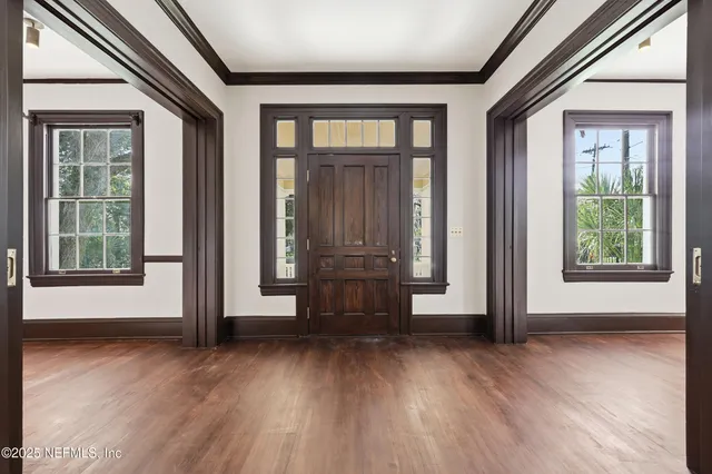 a view of livingroom with furniture wooden floor and window