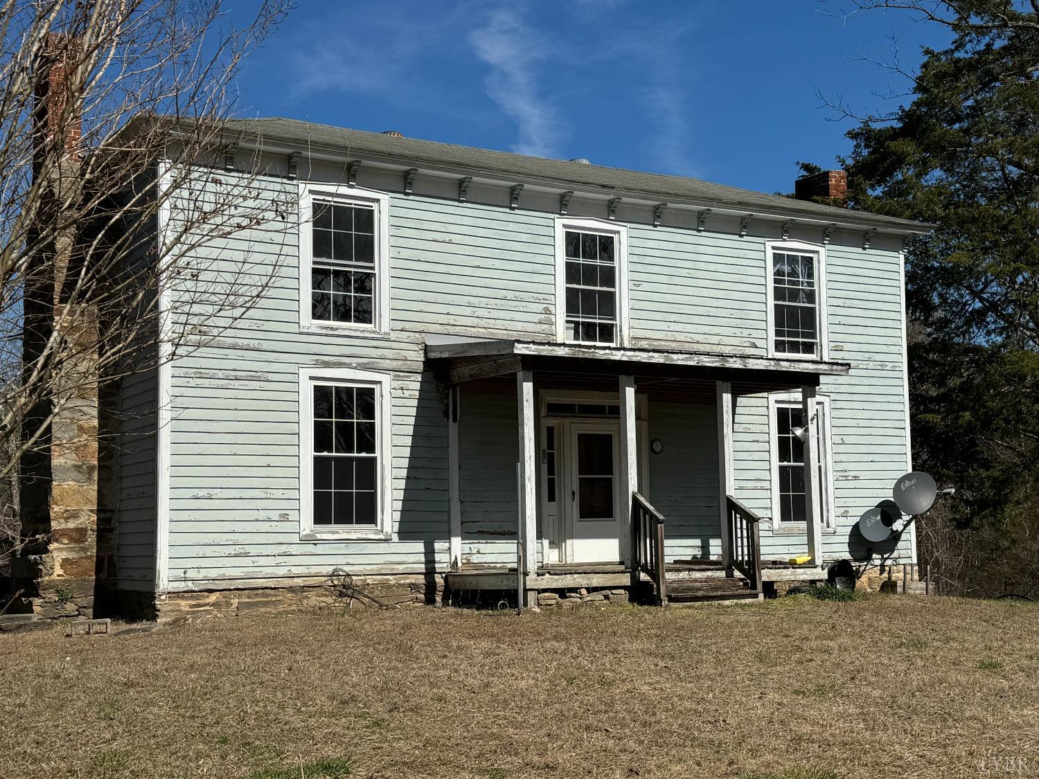 3752 Rolling Hill Road Pamplin, VA 23958 - Photo 1 of 16 a front view of a house with two windows