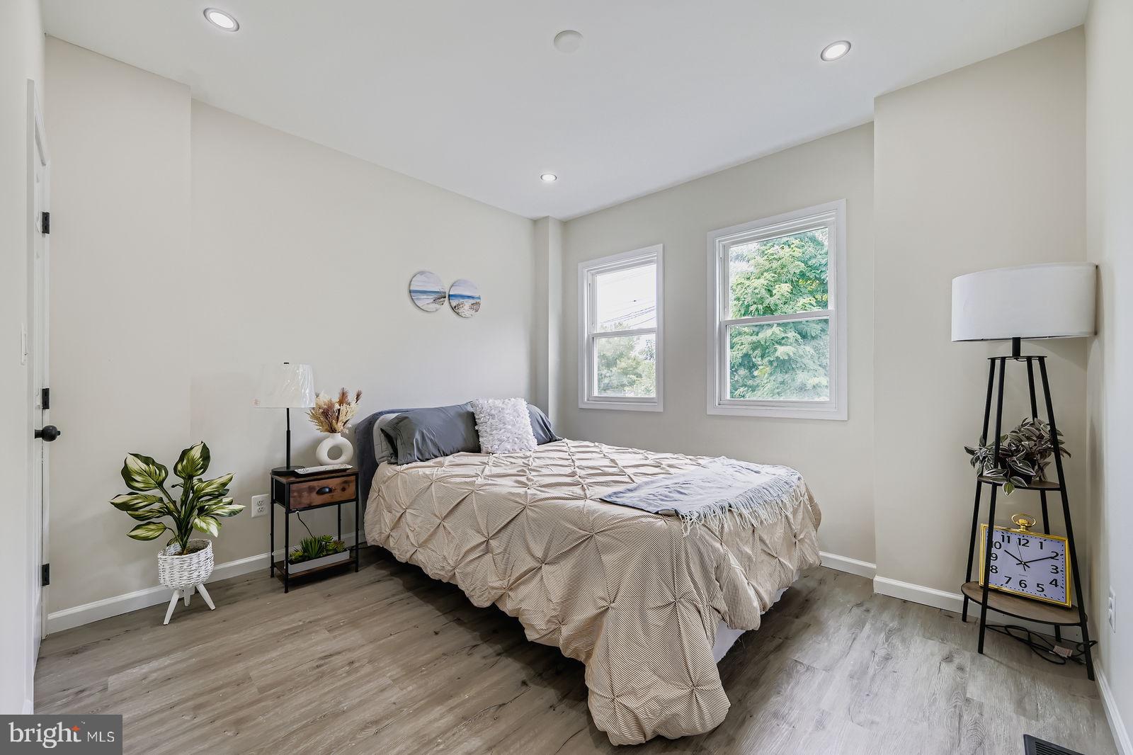 3429 Reisterstown Road Baltimore, MD 21215 - Photo 24 of 28 a bedroom with a bed and a window