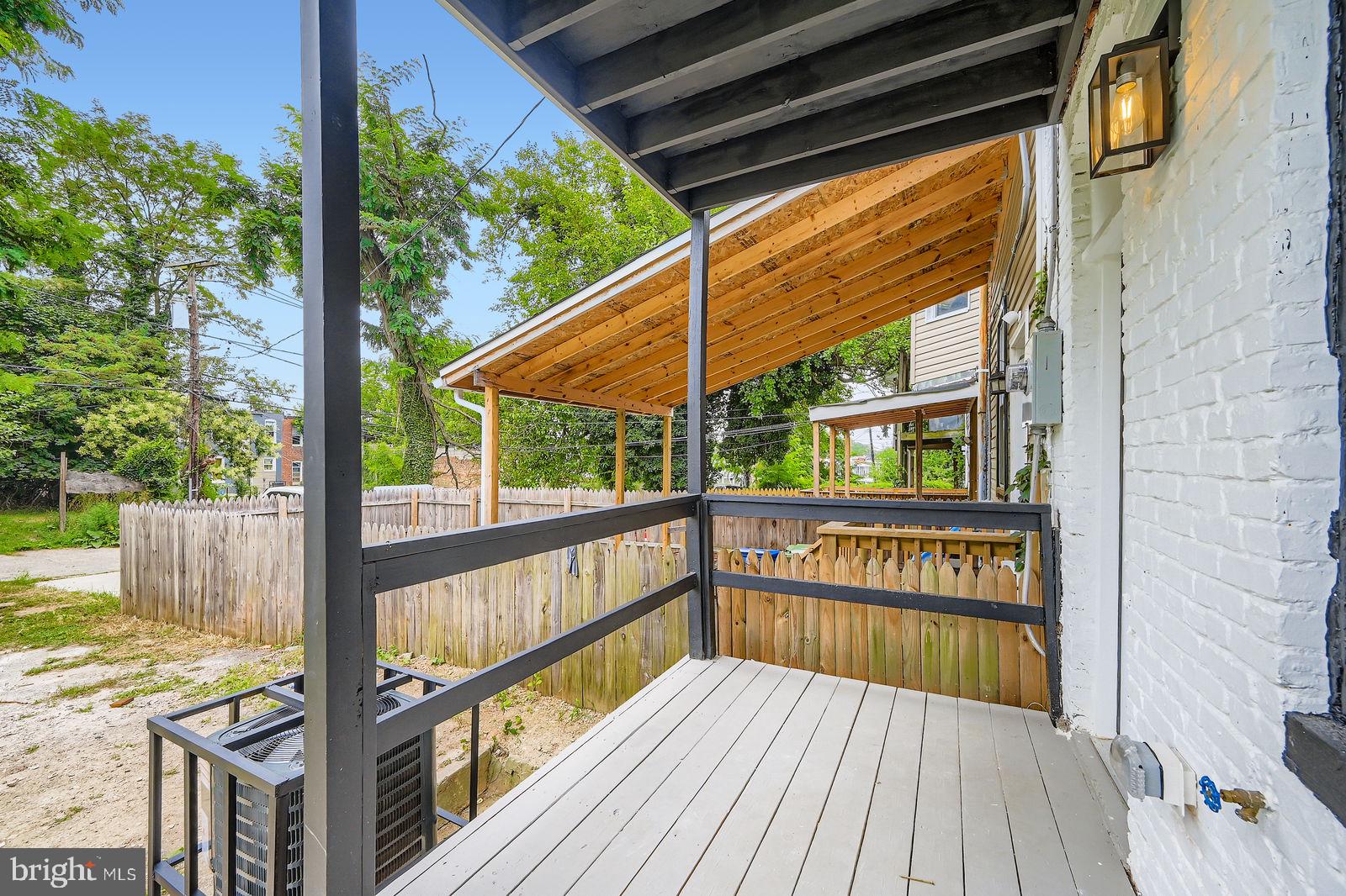 3429 Reisterstown Road Baltimore, MD 21215 - Photo 27 of 28 a view of balcony with wooden floor