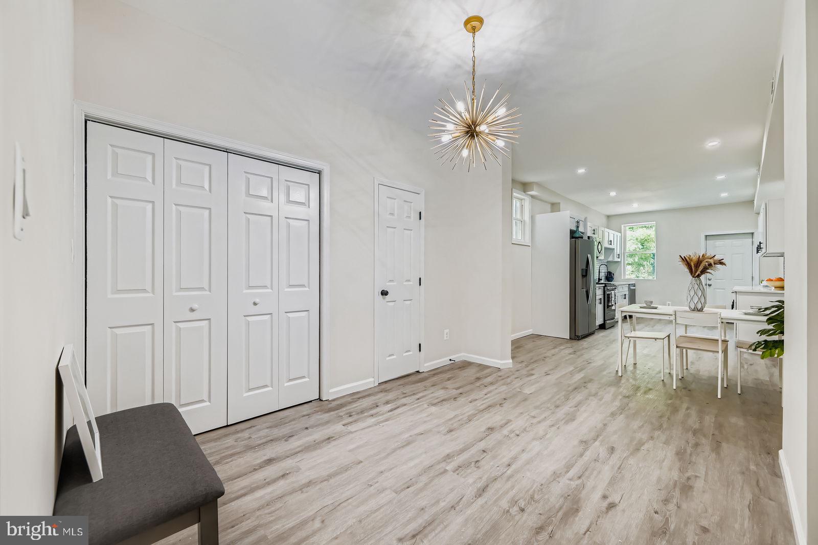3429 Reisterstown Road Baltimore, MD 21215 - Photo 9 of 28 a view of a livingroom with furniture nad wooden floor