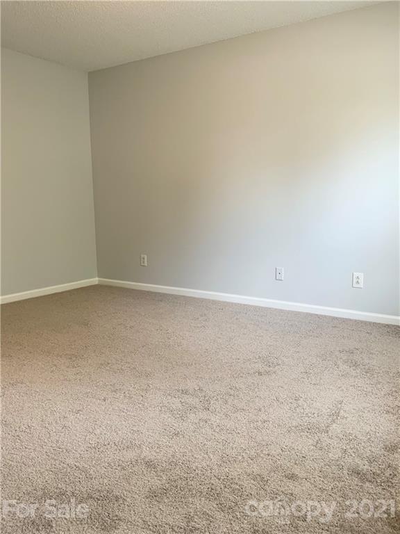 5136 Deerton Road Charlotte, NC 28269 - Photo 6 of 18 a view of an empty room
