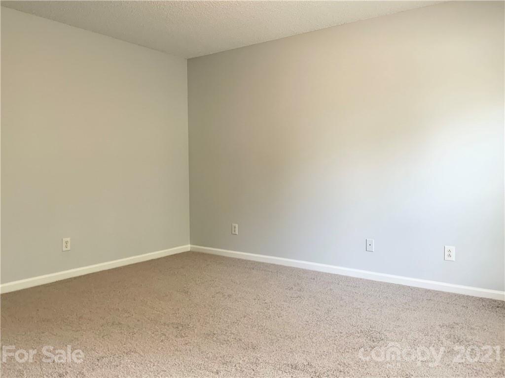 5136 Deerton Road Charlotte, NC 28269 - Photo 10 of 18 a view of an empty room