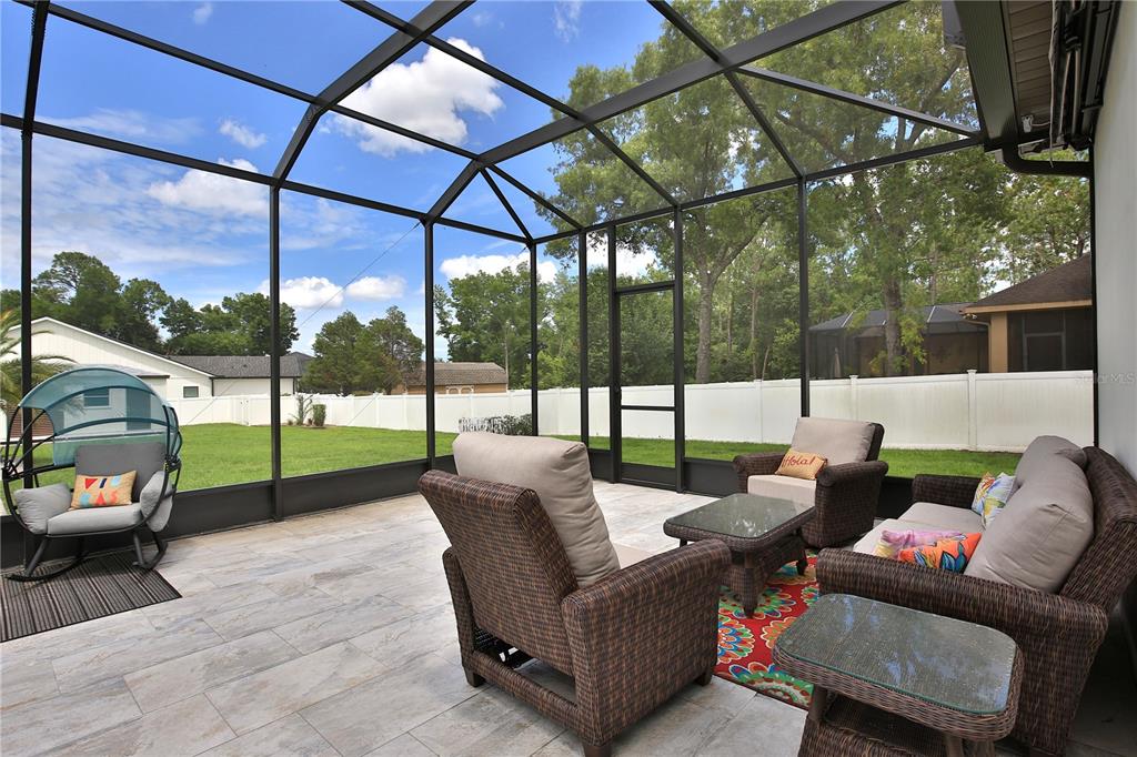 5845 Southwest 43rd St Road Ocala, FL 34474 - Photo 34 of 38 a building outdoor space with patio