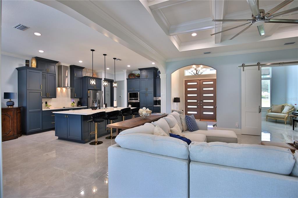 5845 Southwest 43rd St Road Ocala, FL 34474 - Photo 9 of 38 a living room with furniture and a large window
