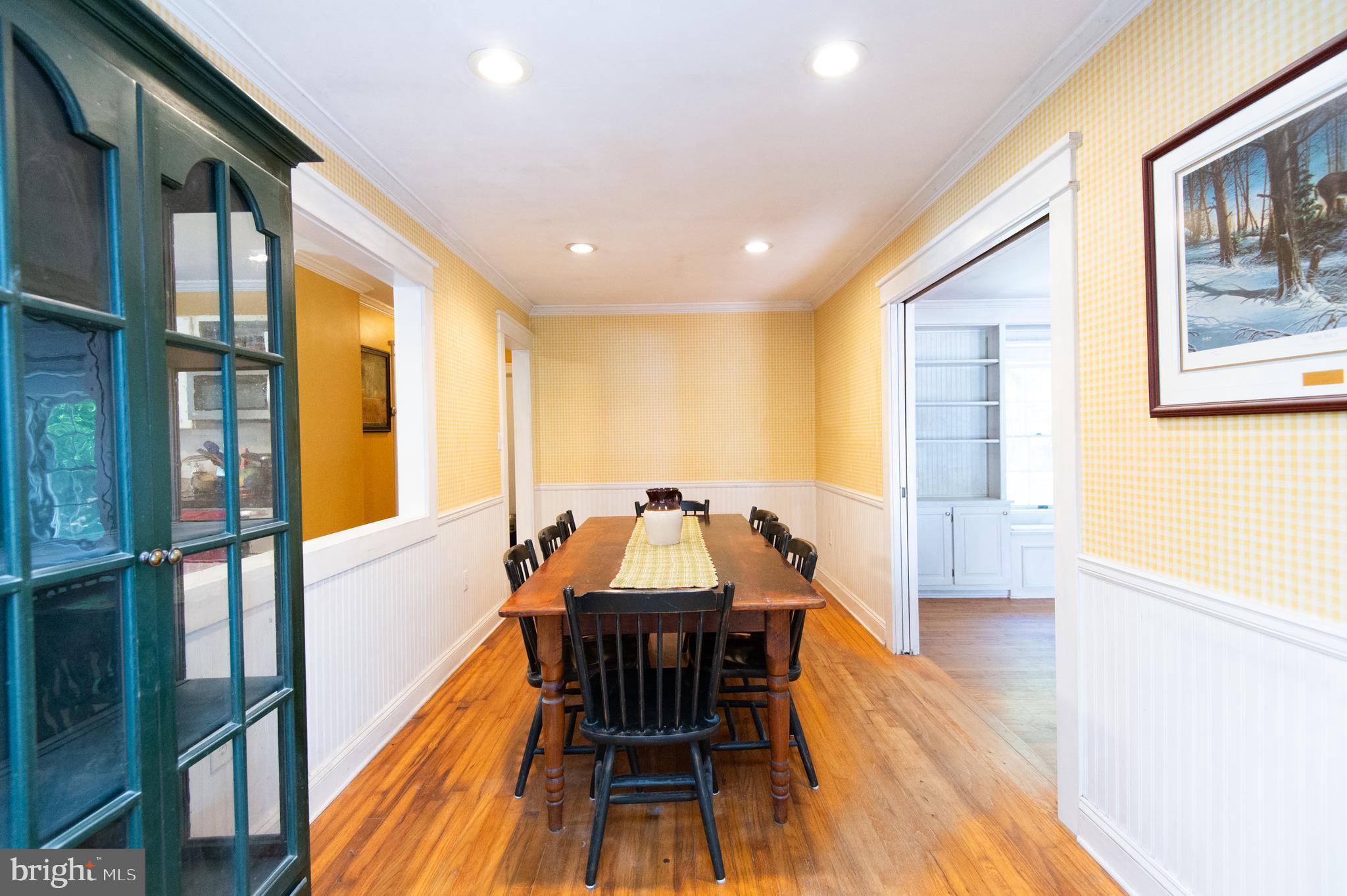 23130 Sparks Road Ridgely, MD 21660 - Photo 16 of 74 a view of a dining room with furniture window and wooden floor