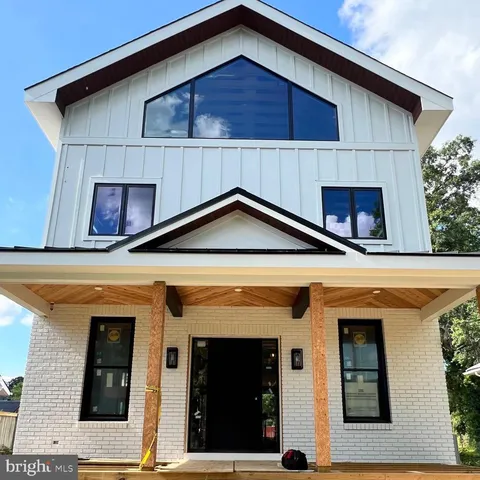 a front view of a house with garage