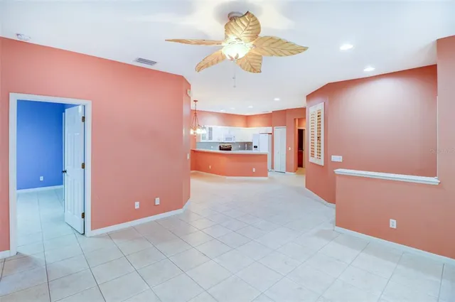 a bathroom with a sink a toilet a mirror and shower