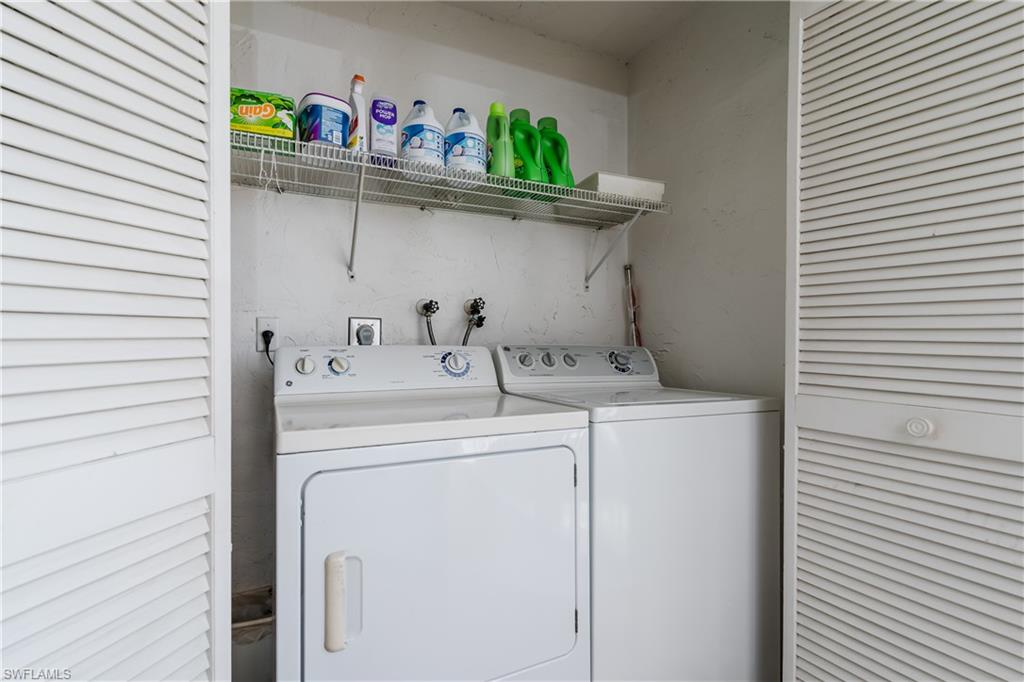5515 Rattlesnake Hammock Road, Unit 205 Naples, FL 34113 - Photo 21 of 46 Bathroom featuring a tile shower, toilet, vanity, and visible vents