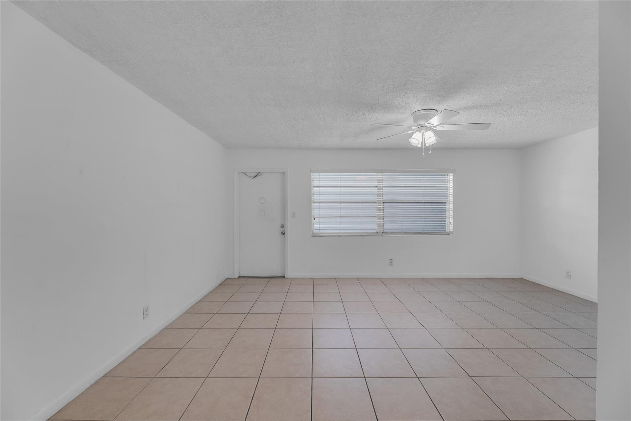 2201 Northeast 36th Street, Unit 207 Lighthouse Point, FL 33064 - Photo 19 of 35 Front entrance and great natural light