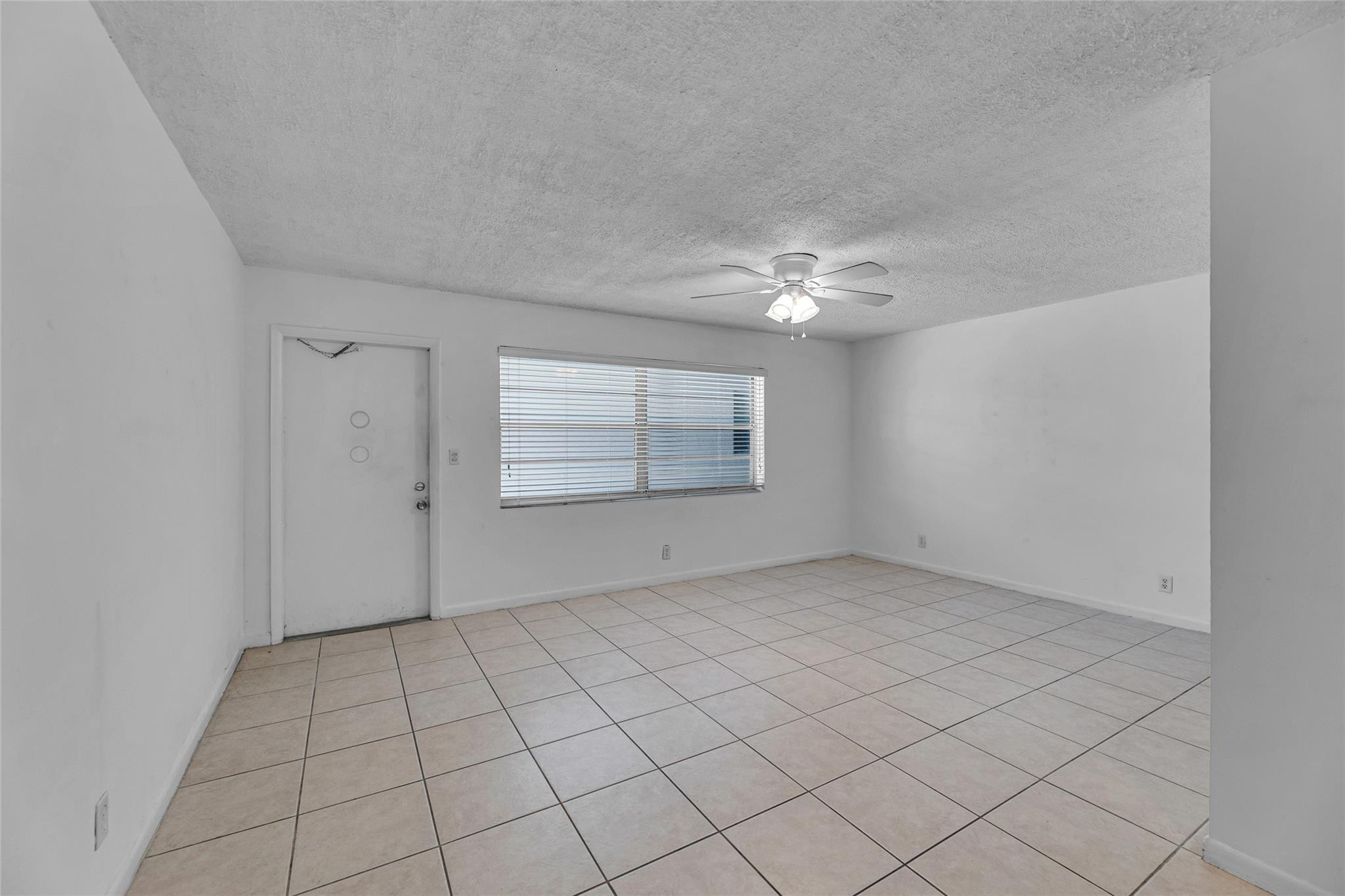 2201 Northeast 36th Street, Unit 207 Lighthouse Point, FL 33064 - Photo 20 of 35 Living room / dining room combo