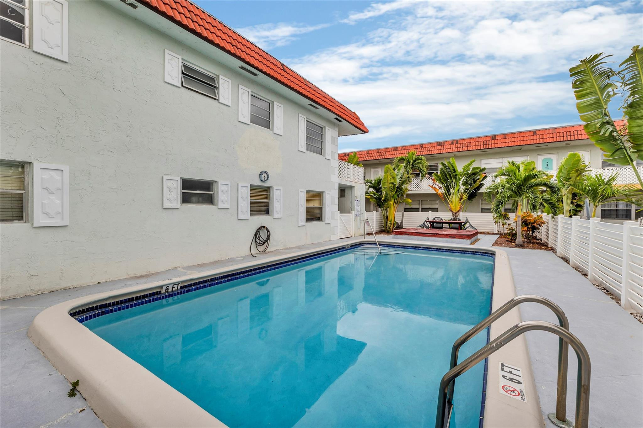 2201 Northeast 36th Street, Unit 207 Lighthouse Point, FL 33064 - Photo 26 of 35 Community pool for all residents