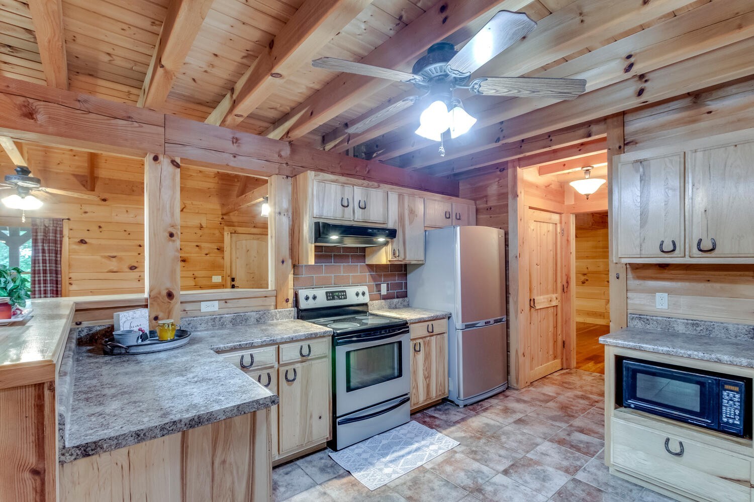5359 Craddock Road Lascassas, TN 37085 - Photo 18 of 67 a kitchen with stainless steel appliances granite countertop a stove refrigerator sink and dishwasher
