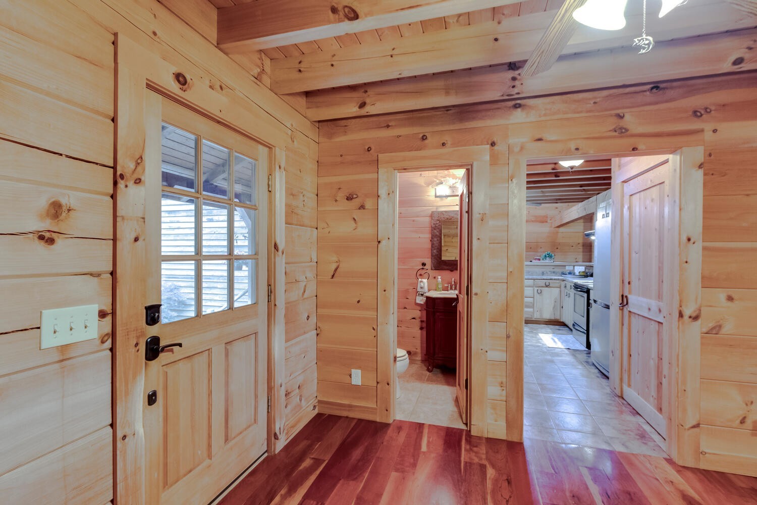 5359 Craddock Road Lascassas, TN 37085 - Photo 20 of 67 a view of a hallway with wooden floor and a bathroom