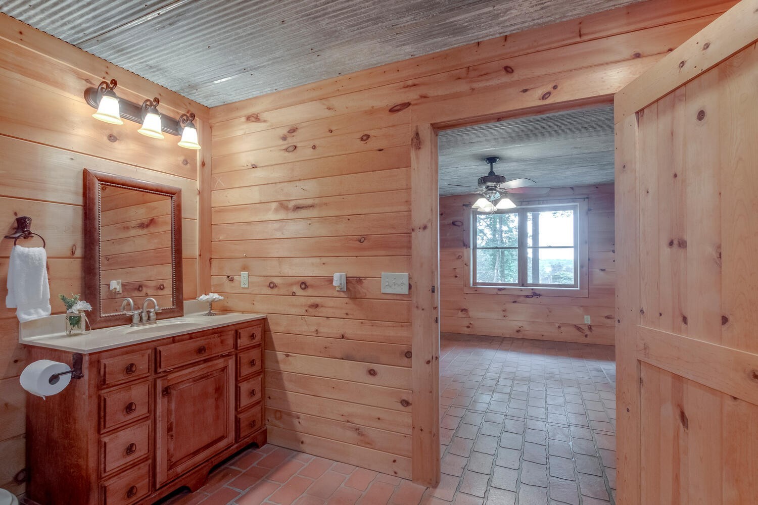 5359 Craddock Road Lascassas, TN 37085 - Photo 26 of 67 a bathroom with a sink a mirror and a shower
