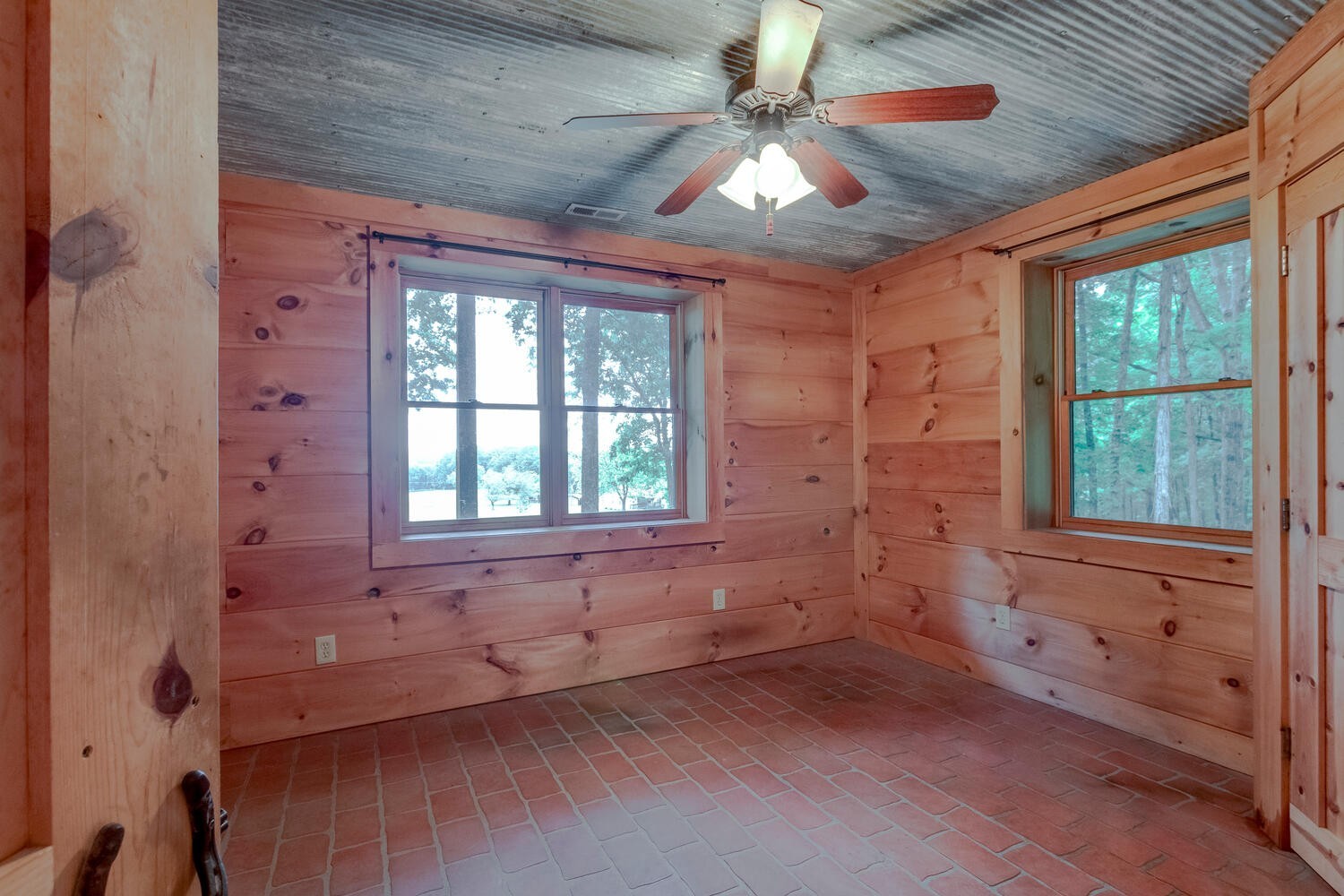 5359 Craddock Road Lascassas, TN 37085 - Photo 34 of 67 an empty room with chandelier fan and windows