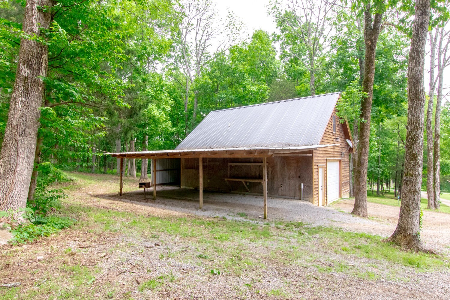 5359 Craddock Road Lascassas, TN 37085 - Photo 50 of 67 a house with trees in the background