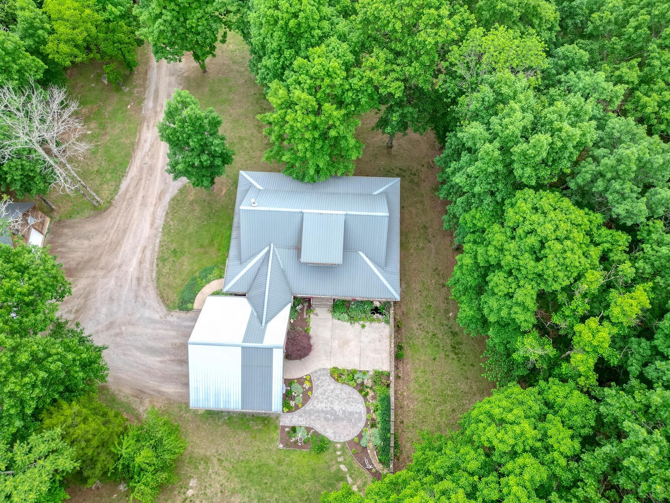 5359 Craddock Road Lascassas, TN 37085 - Photo 60 of 67 an aerial view of a house with outdoor space and trees all around