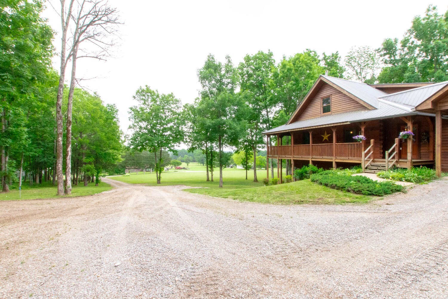 5359 Craddock Road Lascassas, TN 37085 - Photo 7 of 67 a front view of a house with a yard and trees