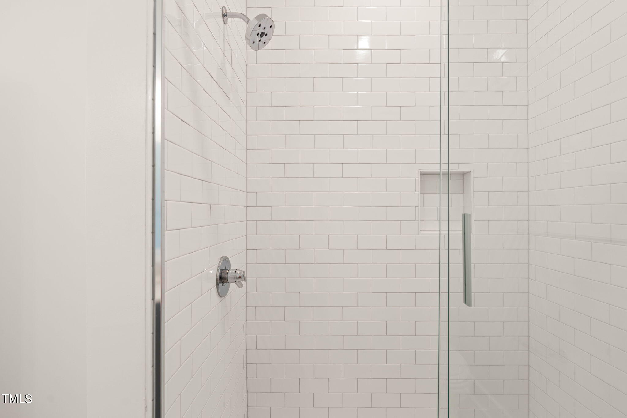 615 Daniels Street, Unit 215 Raleigh, NC 27605 - Photo 20 of 37 a bathroom with a shower