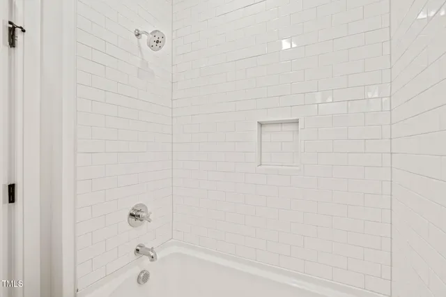 a bathroom with a sink toilet and mirror