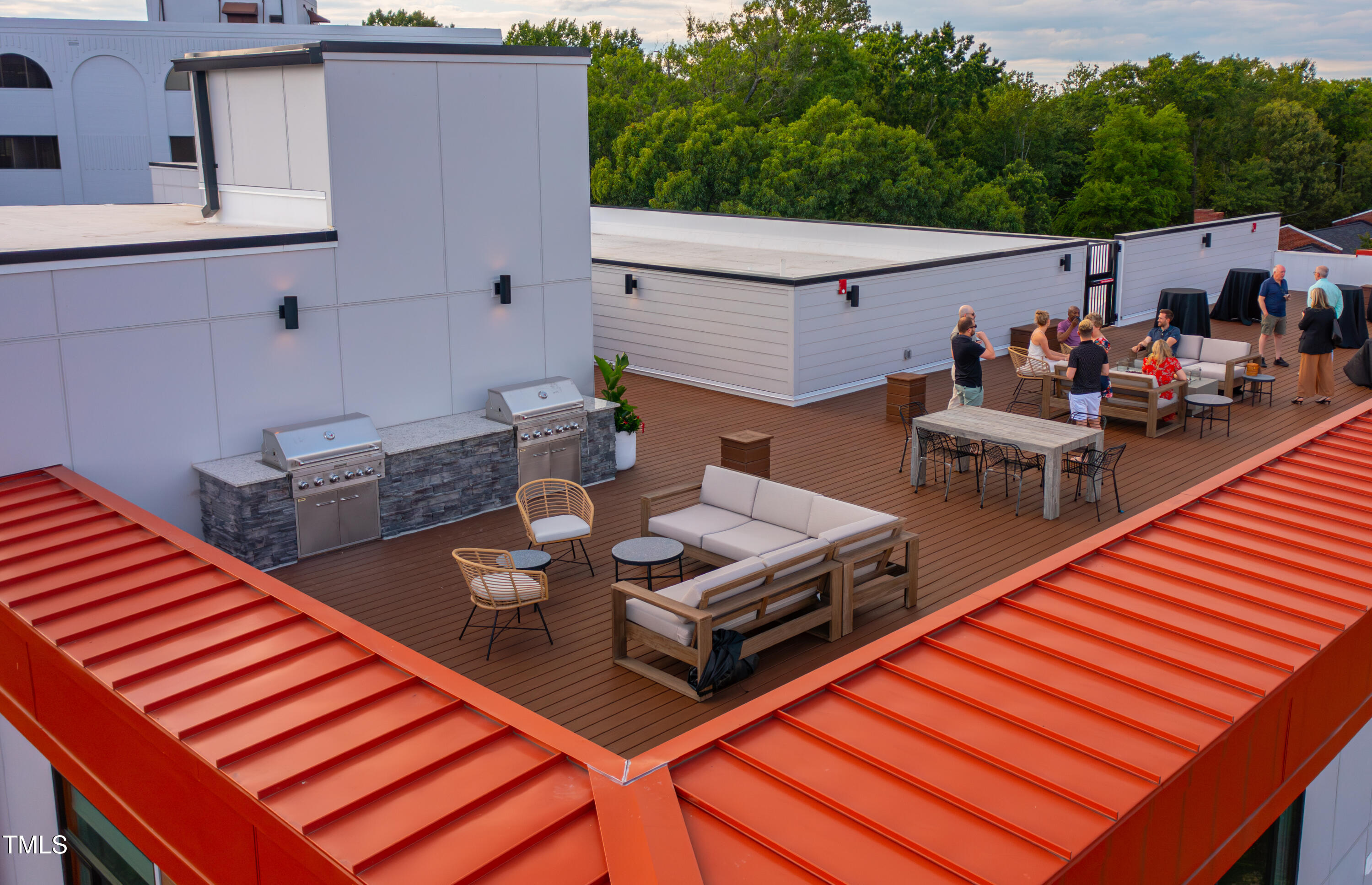 615 Daniels Street, Unit 215 Raleigh, NC 27605 - Photo 29 of 37 a view of a patio with chairs and a table