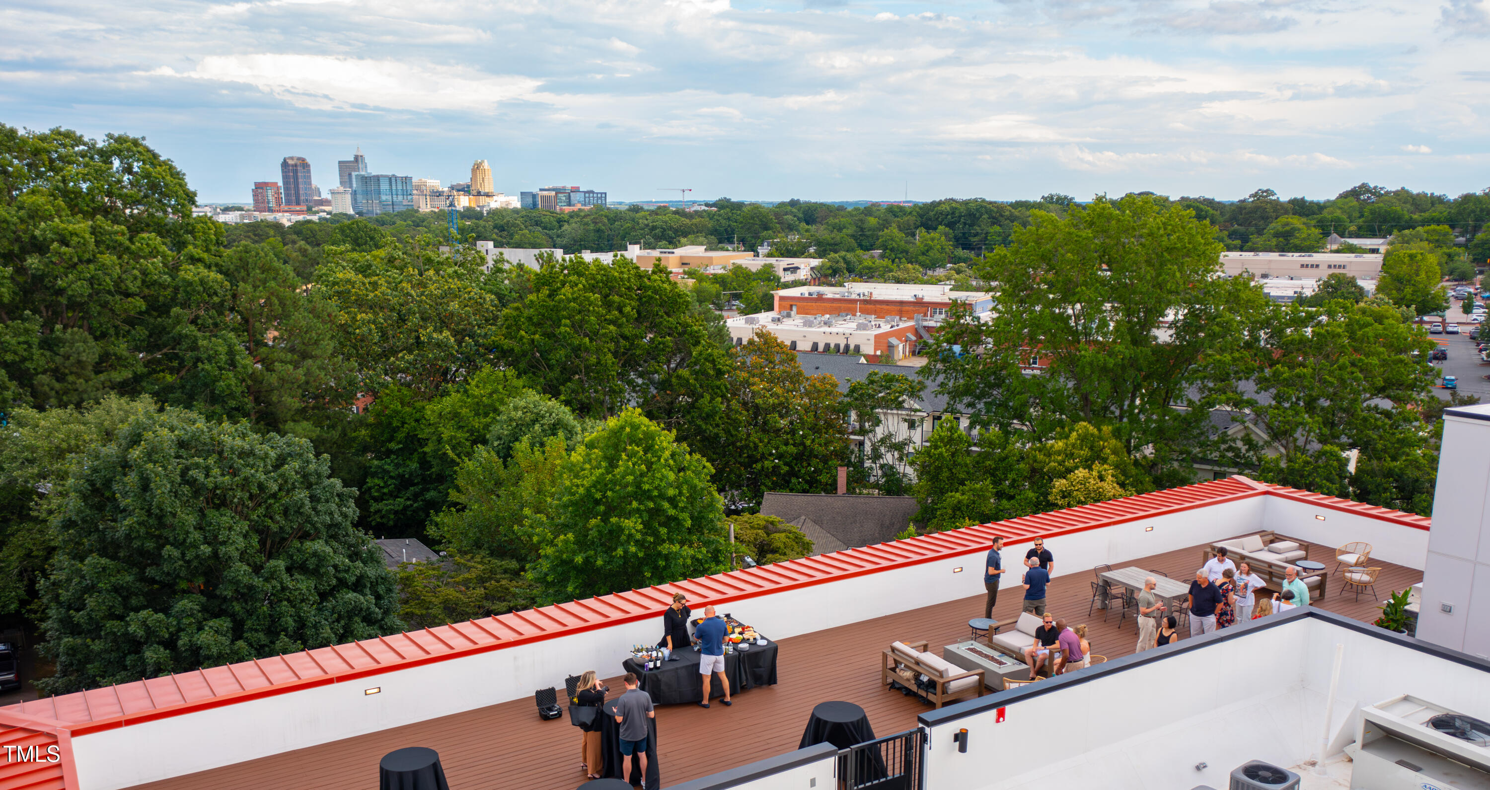 615 Daniels Street, Unit 215 Raleigh, NC 27605 - Photo 30 of 37 a view of a city from a terrace