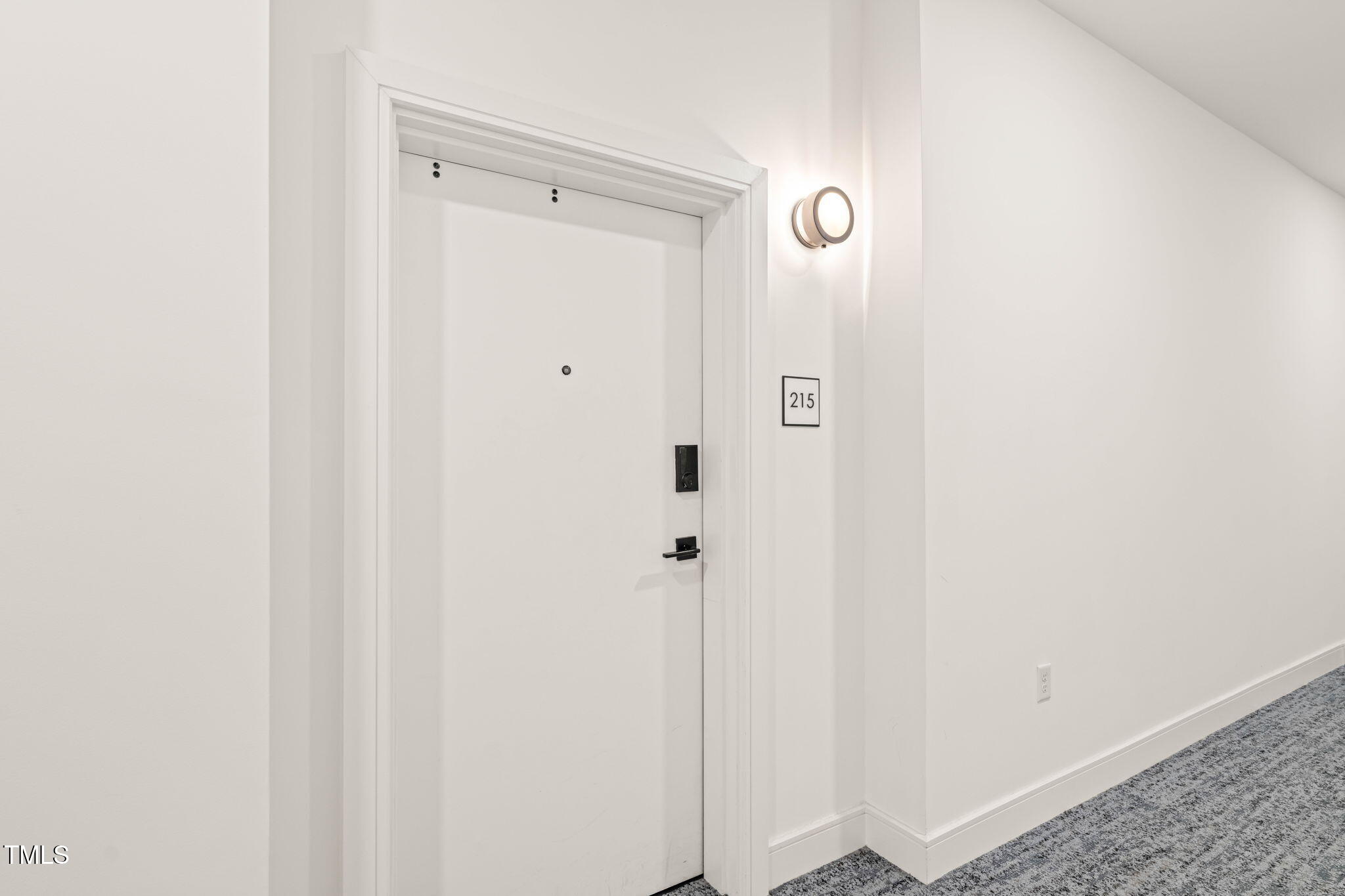 615 Daniels Street, Unit 215 Raleigh, NC 27605 - Photo 5 of 37 a bathroom with a shower