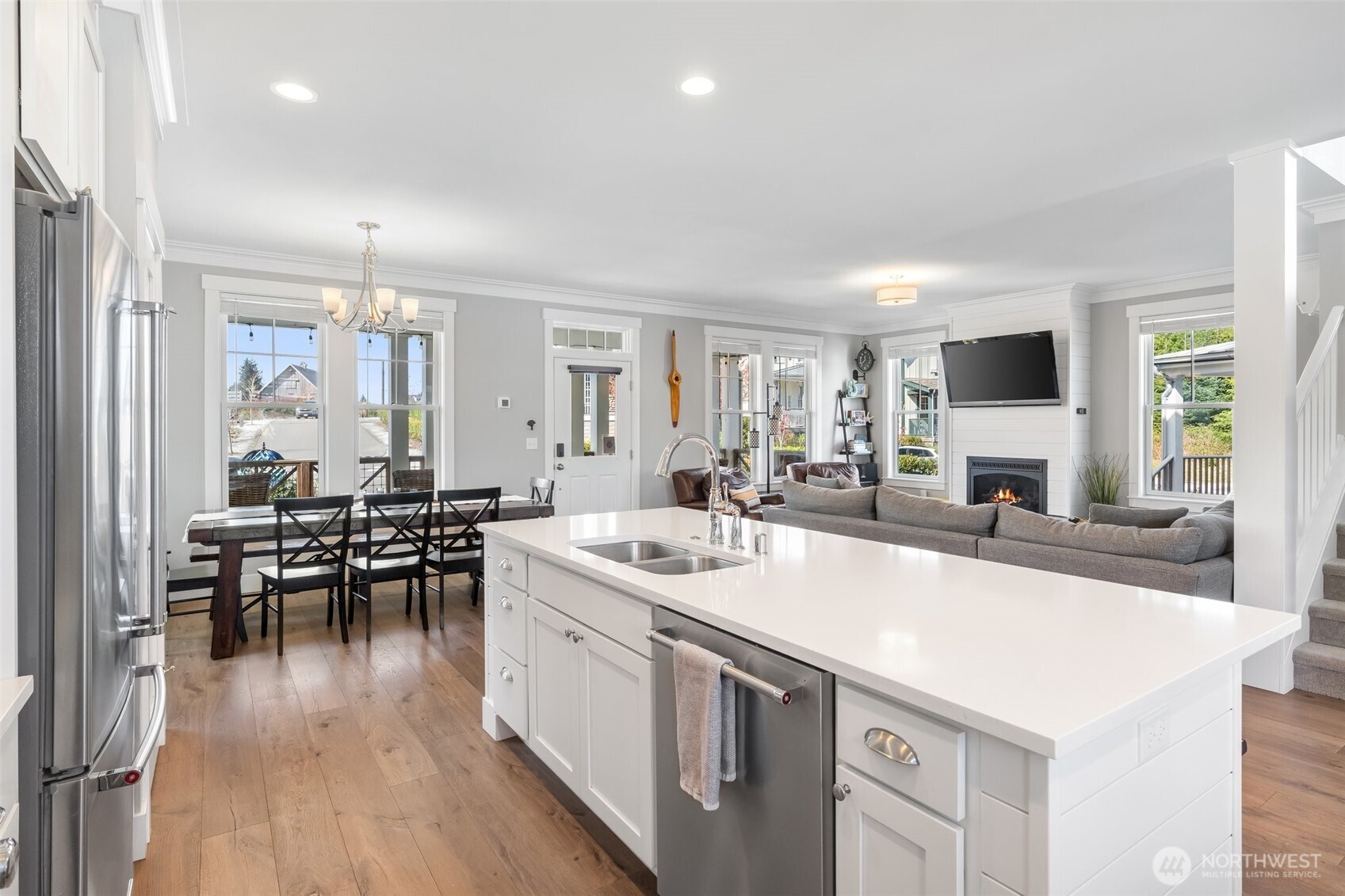 11 Horizon Street Pacific Beach, WA 98571 - Photo 12 of 40 a large white kitchen with a table and chairs