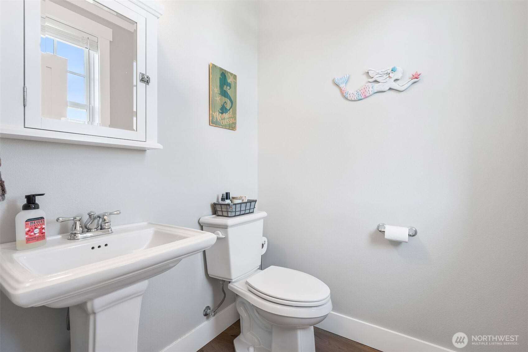 11 Horizon Street Pacific Beach, WA 98571 - Photo 15 of 40 a bathroom with a sink mirror and toilet