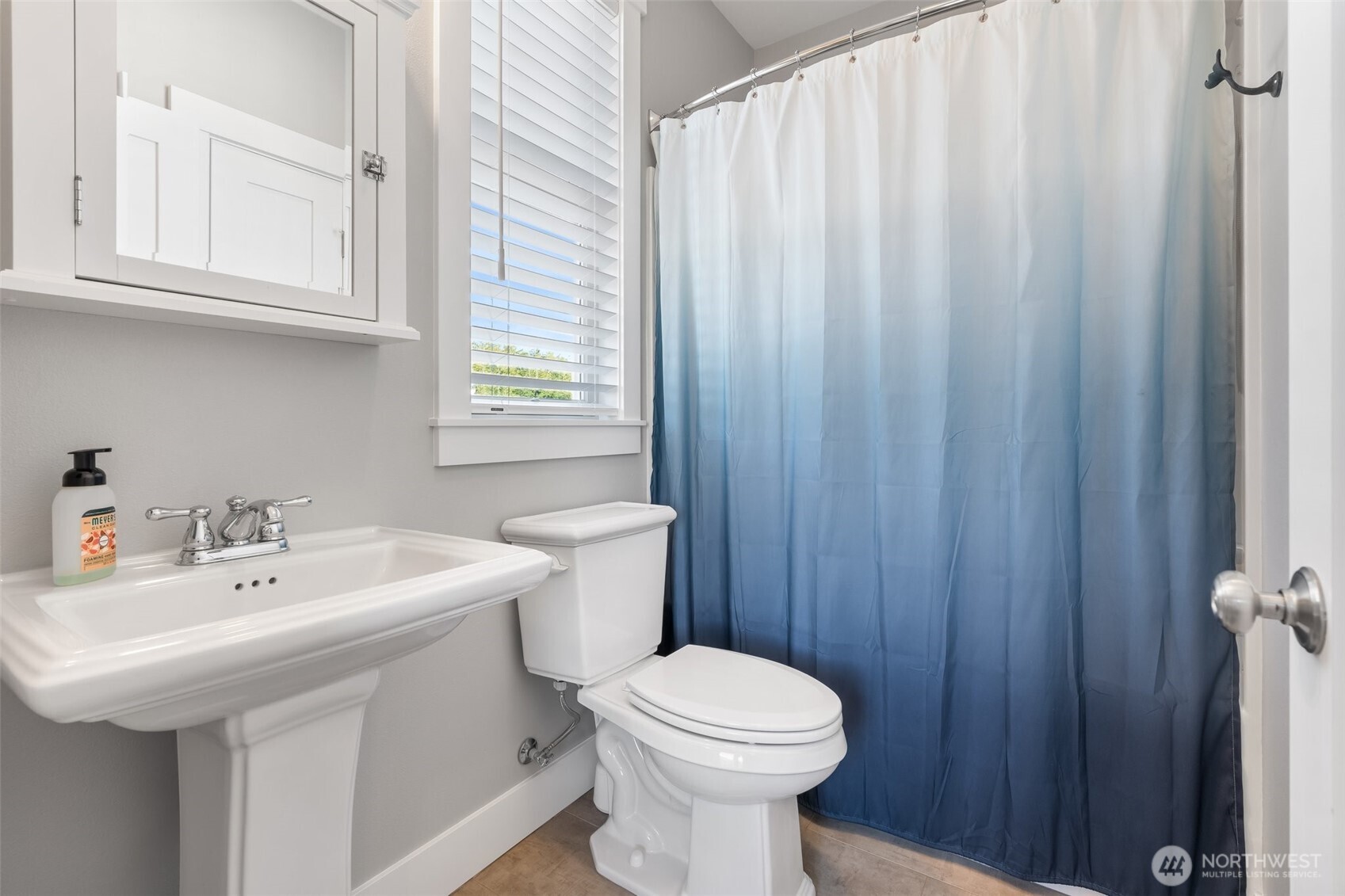 11 Horizon Street Pacific Beach, WA 98571 - Photo 22 of 40 a bathroom with a sink a toilet and shower