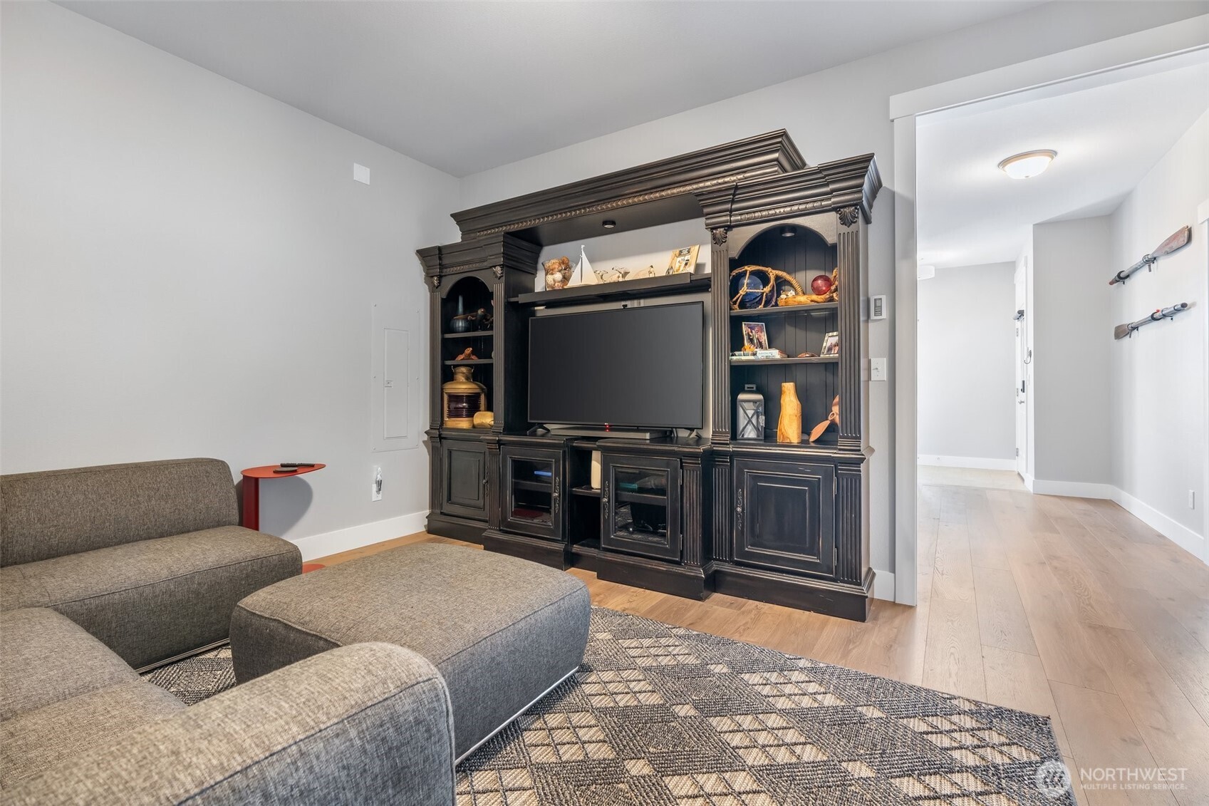 11 Horizon Street Pacific Beach, WA 98571 - Photo 25 of 40 a living room with furniture and a flat screen tv