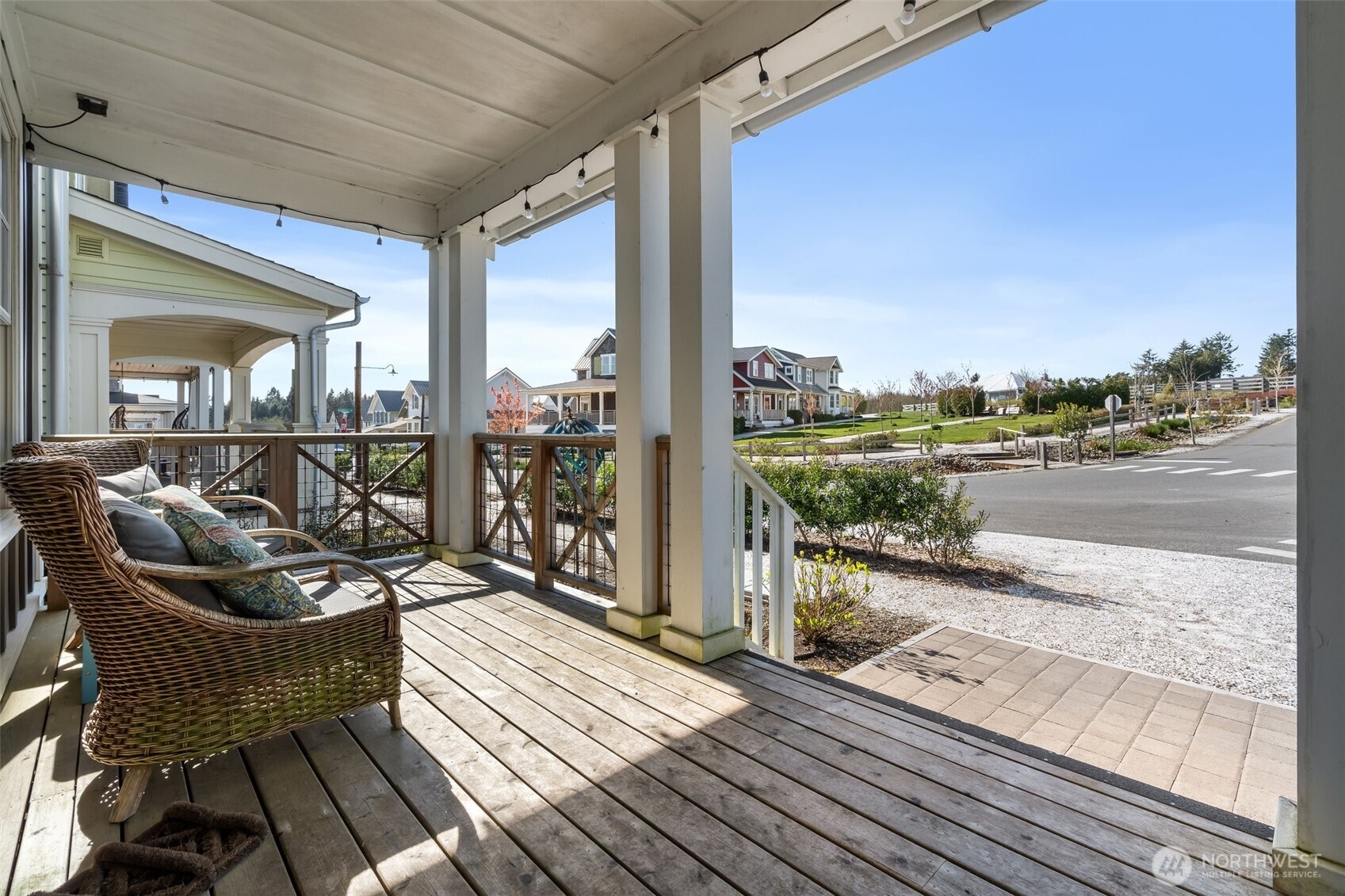 11 Horizon Street Pacific Beach, WA 98571 - Photo 4 of 40 a balcony with wooden floor table and chairs