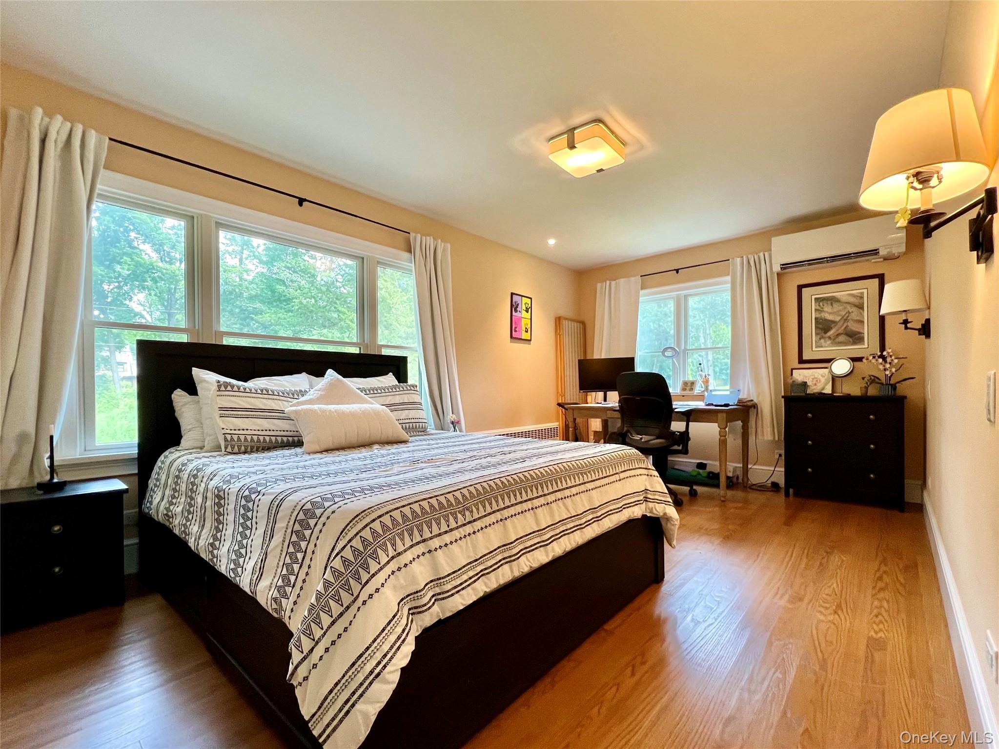 119 Mustato Road Katonah, NY 10536 - Photo 13 of 23 a bed room with a bed and a tv