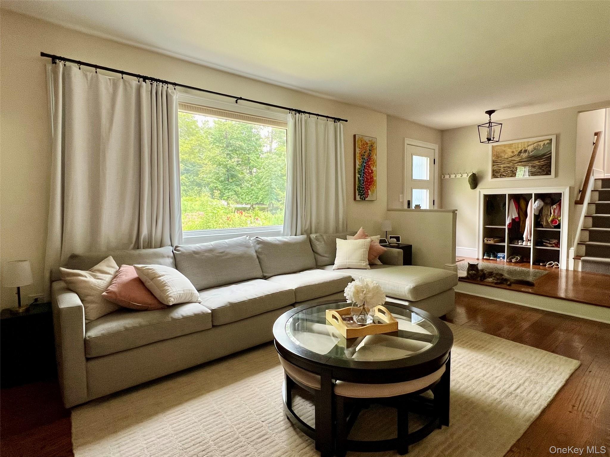 119 Mustato Road Katonah, NY 10536 - Photo 4 of 23 a living room with furniture and a large window
