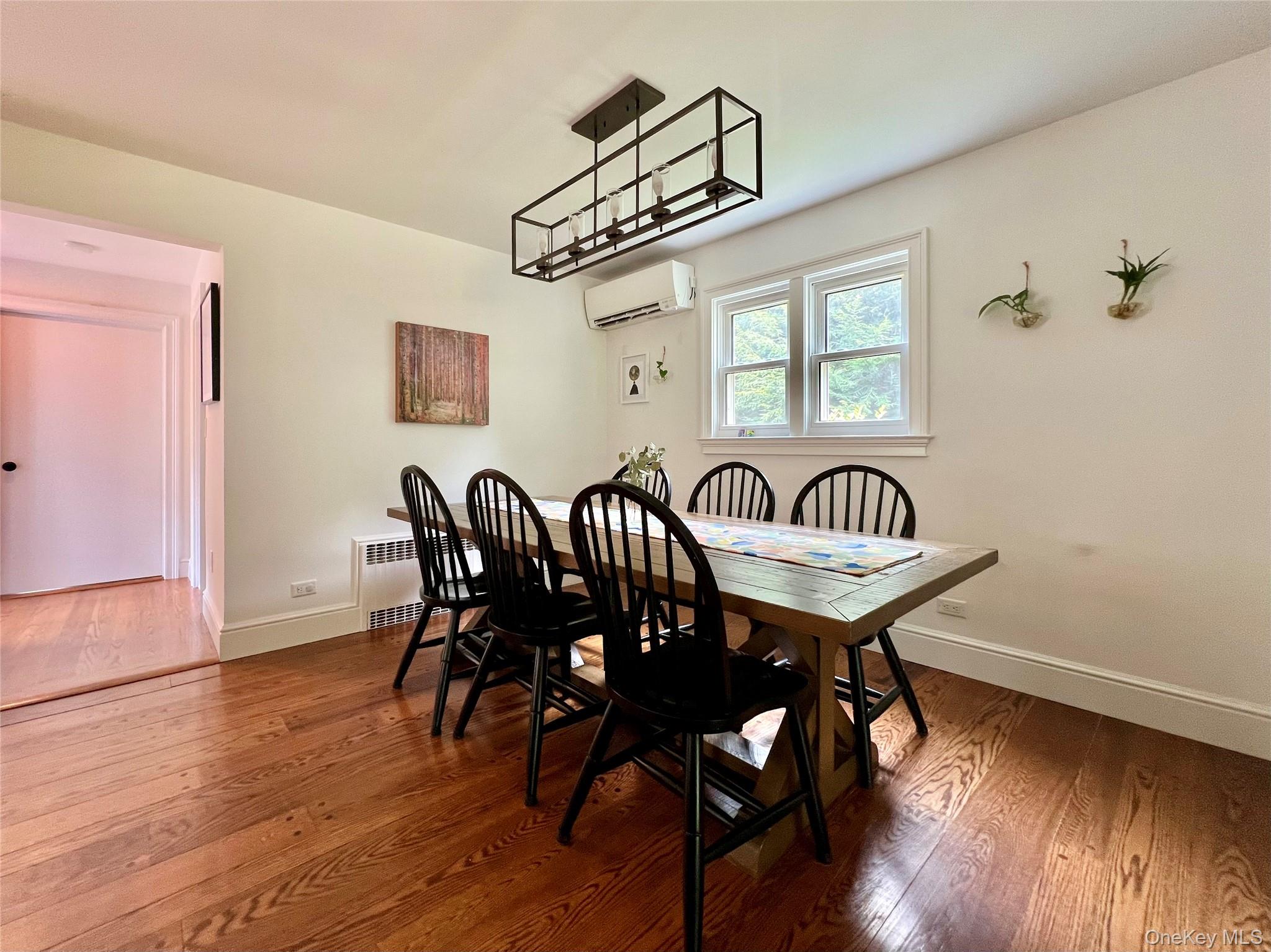 119 Mustato Road Katonah, NY 10536 - Photo 5 of 23 a view of a a dining room with furniture window and wooden floor