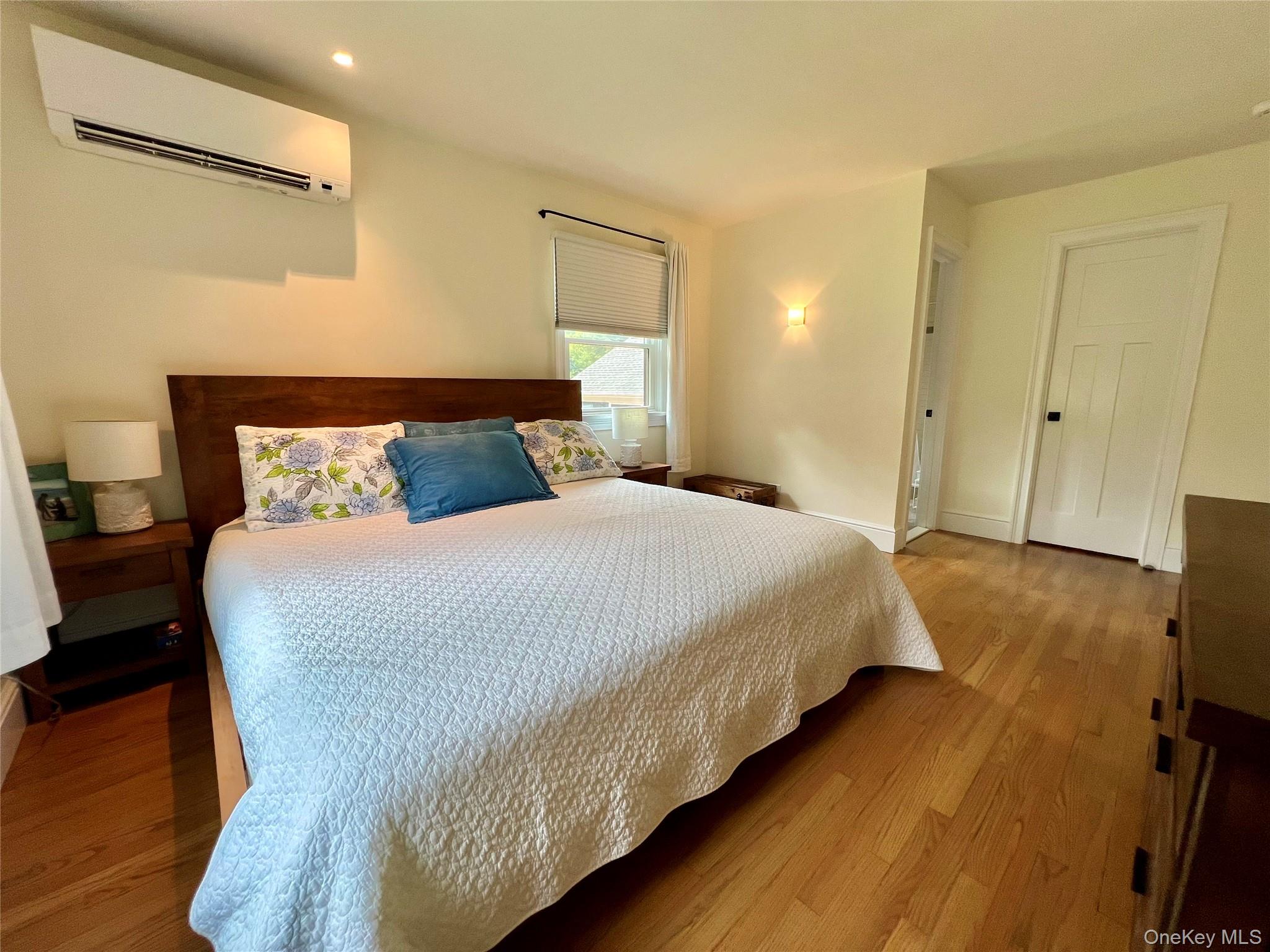 119 Mustato Road Katonah, NY 10536 - Photo 10 of 23 a bedroom with bed and wooden floor