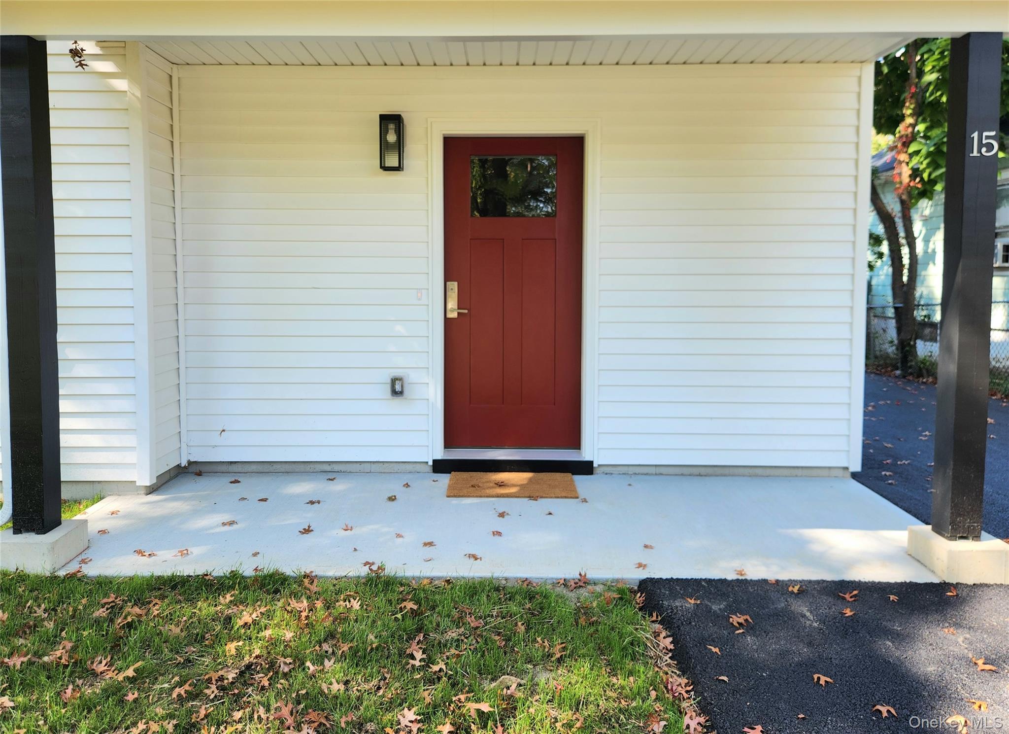 15 Greising Street Pine Bush, NY 12566 - Photo 2 of 22 a front view of a house with a yard