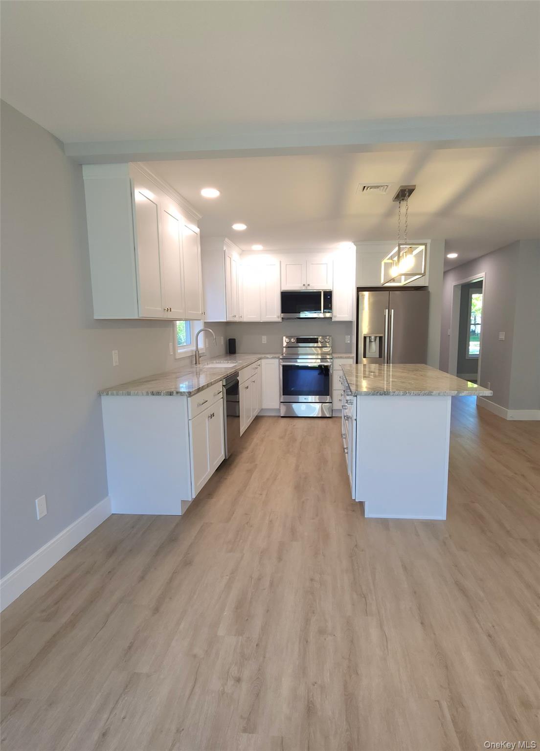 15 Greising Street Pine Bush, NY 12566 - Photo 4 of 22 a large kitchen with lots of counter top space and appliances