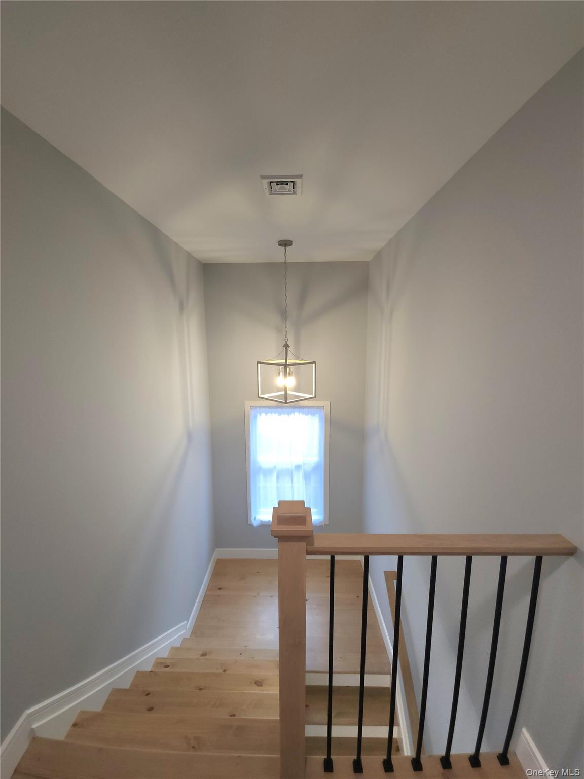 15 Greising Street Pine Bush, NY 12566 - Photo 9 of 22 a view of a hallway with windows