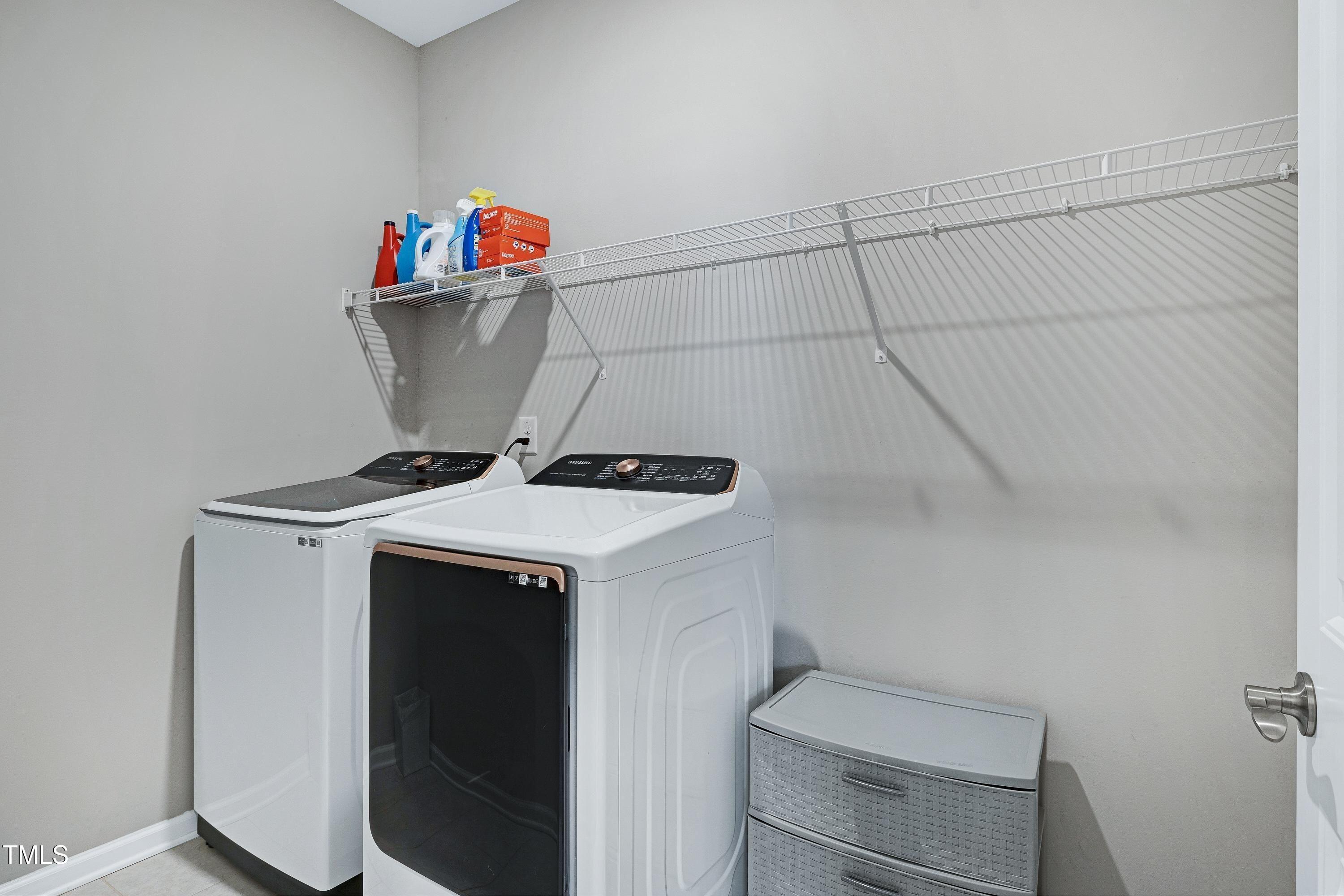 5300 Trilogy Farm Drive Raleigh, NC 27603 - Photo 22 of 50 a utility room with dryer and washer