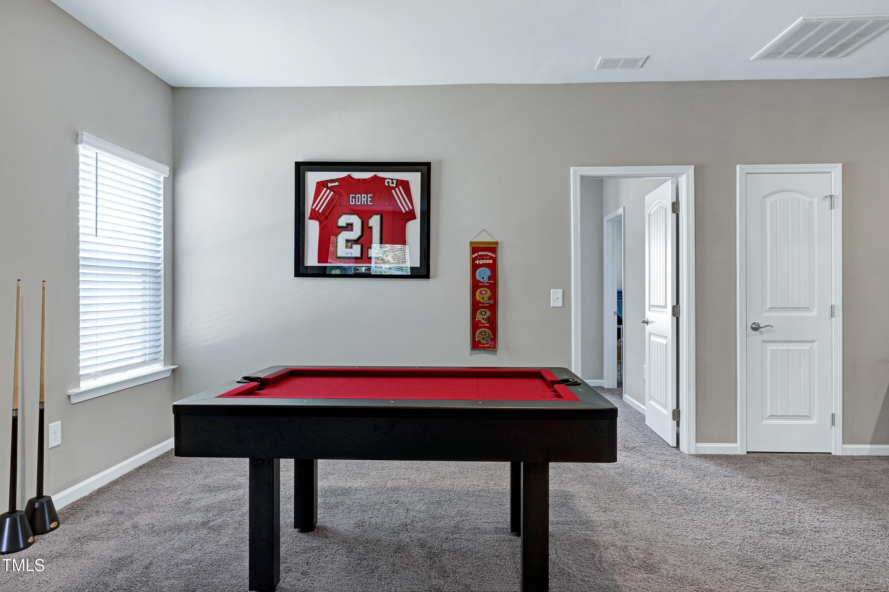 5300 Trilogy Farm Drive Raleigh, NC 27603 - Photo 34 of 50 a bedroom with a bed and a table