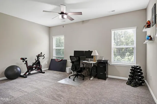 a view of room with gym equipment