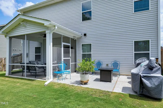 a view of a house with furniture
