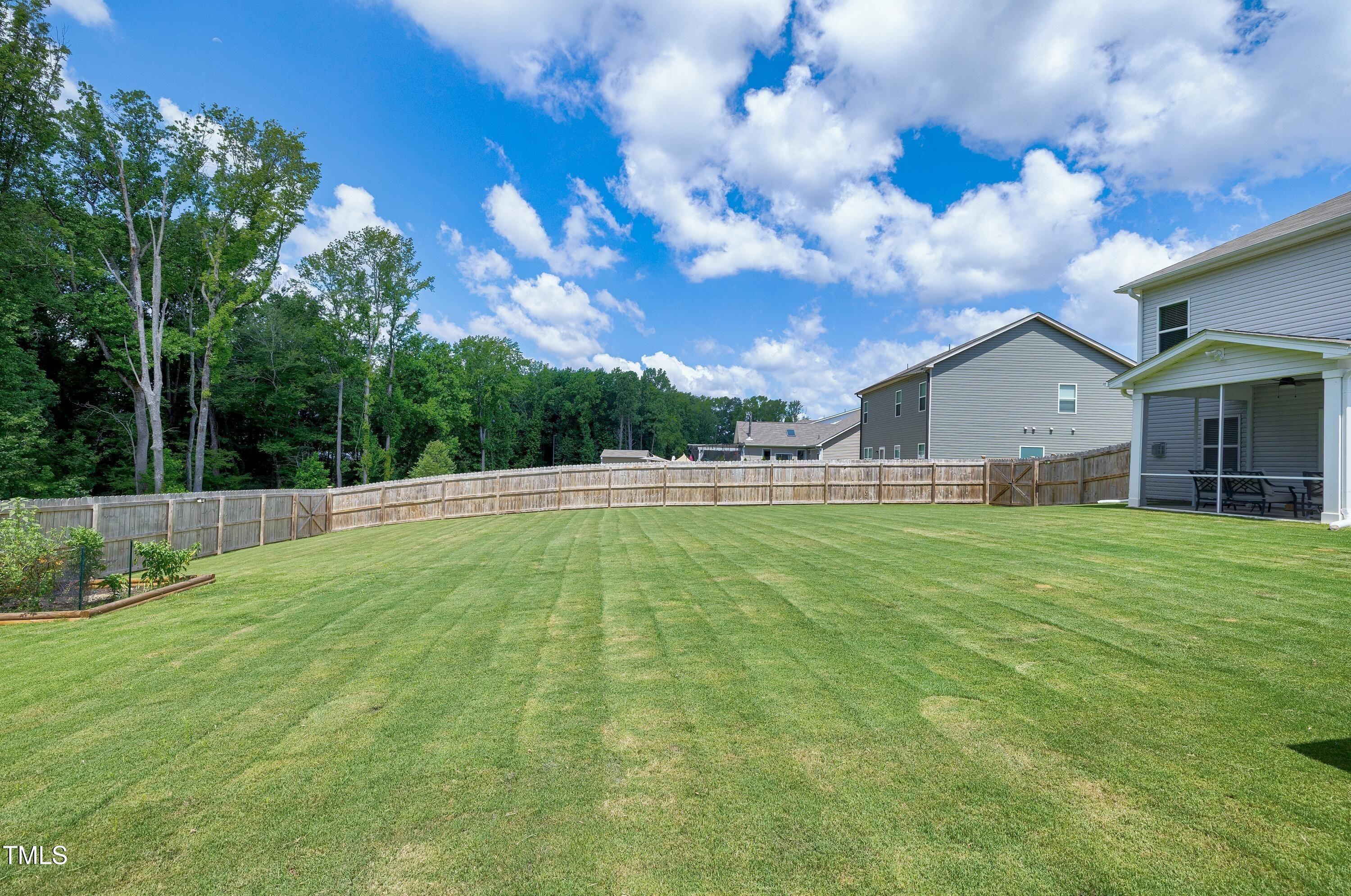 5300 Trilogy Farm Drive Raleigh, NC 27603 - Photo 49 of 50 a view of a backyard