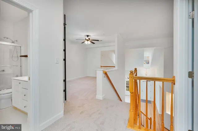 a view of an entryway with wooden floor